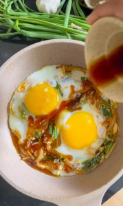 soy sauce fried eggs with scallions